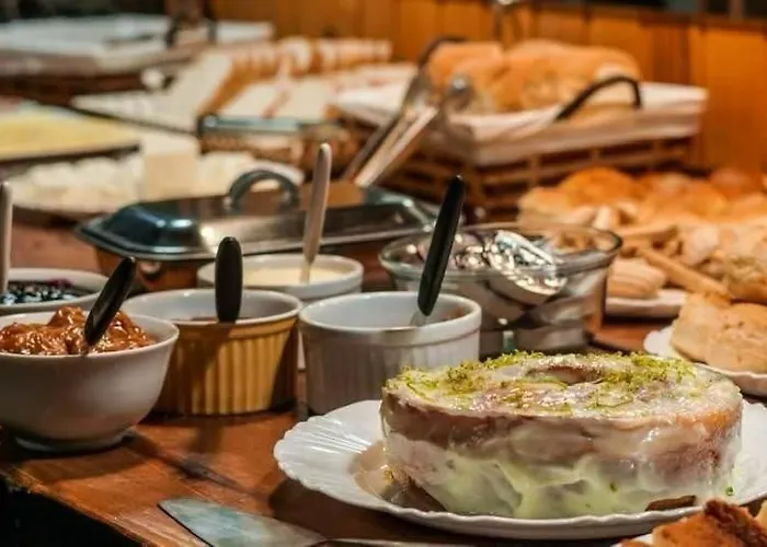 Hotel barato: Pousada Arco Íris com Cafe